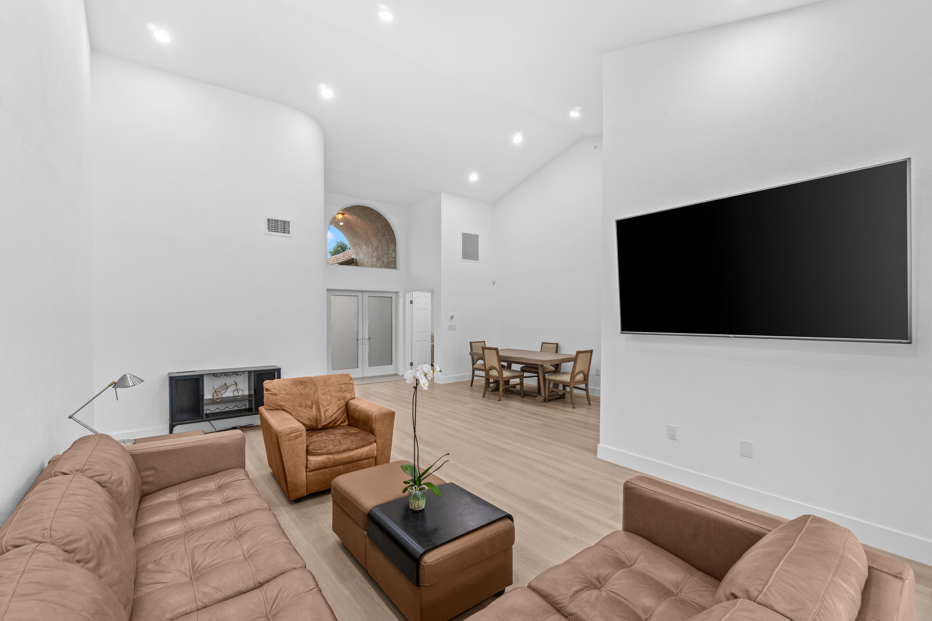 5097 Windsor Parke Drive Boca Raton, FL 33496 - Photo 4 of 30 a living room with furniture and a flat screen tv