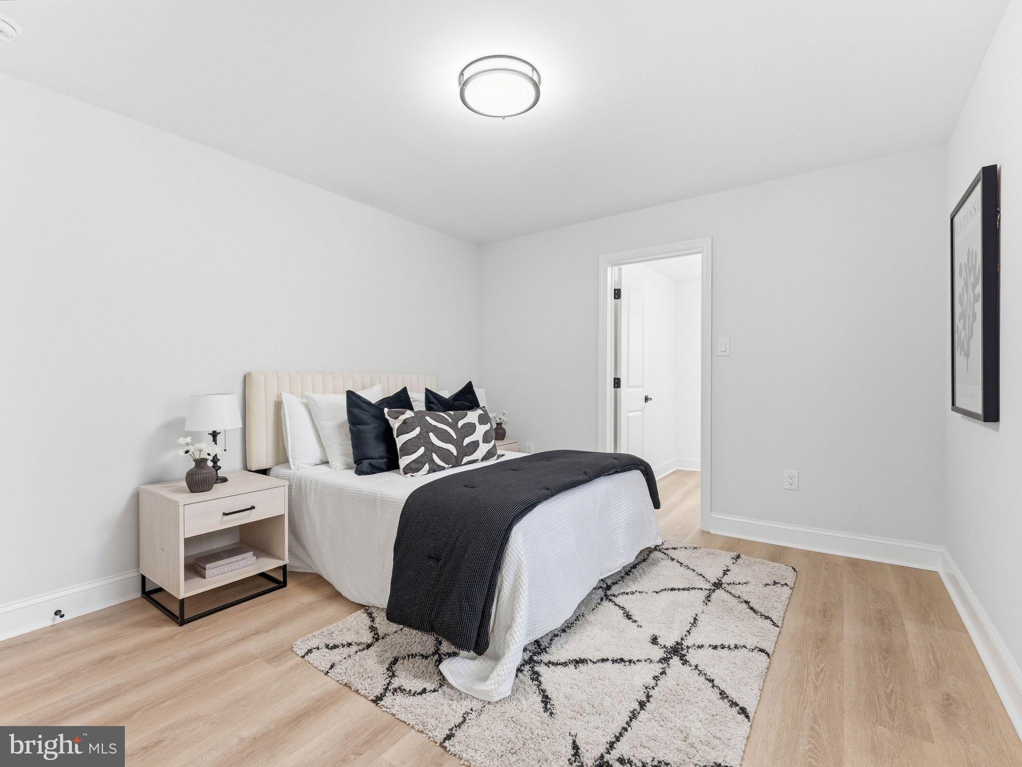505 Greenwood Avenue Maple Shade, NJ 08052 - Photo 12 of 30 a bedroom with a bed and a couch