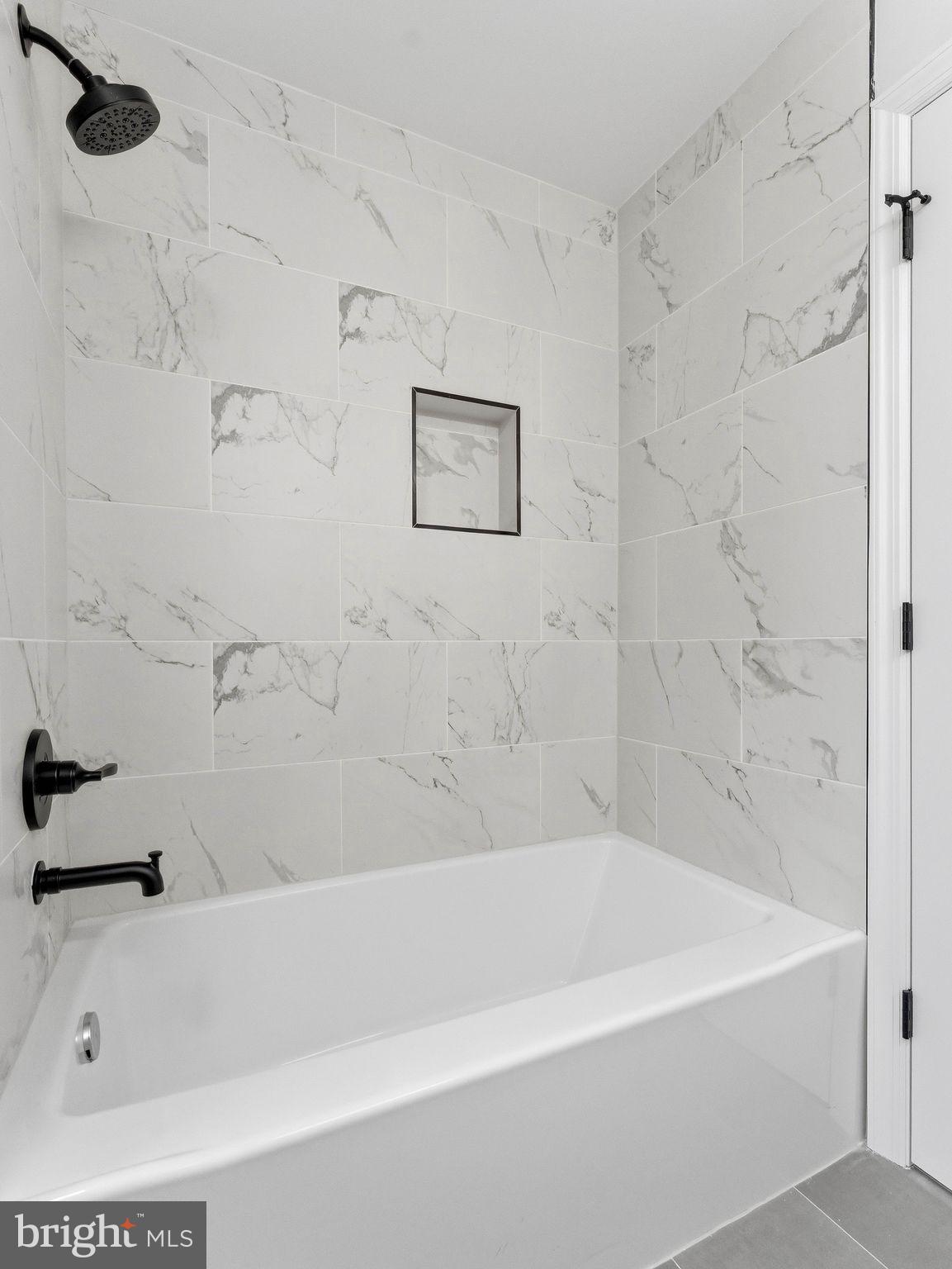 505 Greenwood Avenue Maple Shade, NJ 08052 - Photo 15 of 30 a bathroom with a bathtub