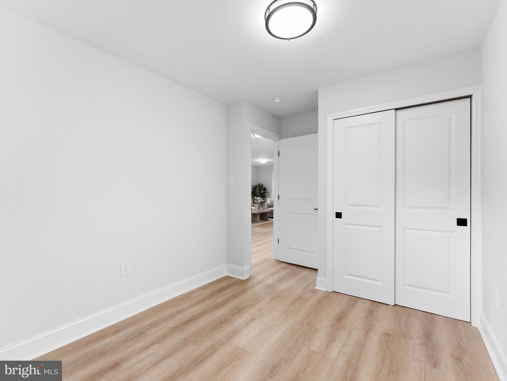 505 Greenwood Avenue Maple Shade, NJ 08052 - Photo 17 of 30 a view of a room with wooden floor and a window