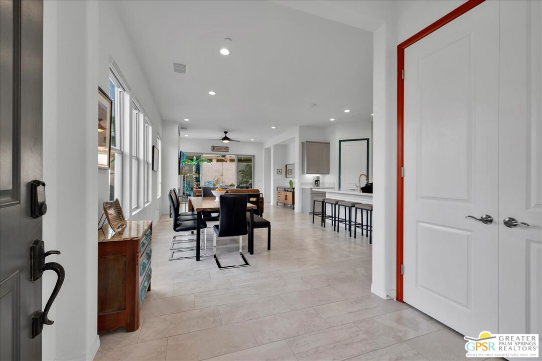 30 Cabernet Rancho Mirage, CA 92270 - Photo 11 of 31 a living room with furniture and a large window