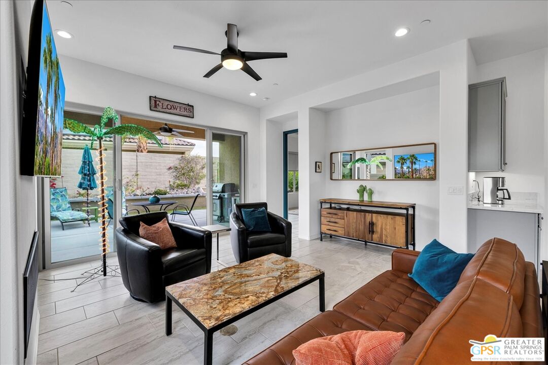 30 Cabernet Rancho Mirage, CA 92270 - Photo 15 of 31 a living room with furniture and a large window