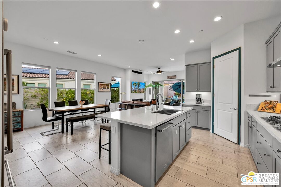 30 Cabernet Rancho Mirage, CA 92270 - Photo 17 of 31 a kitchen with stainless steel appliances granite countertop a sink and a refrigerator