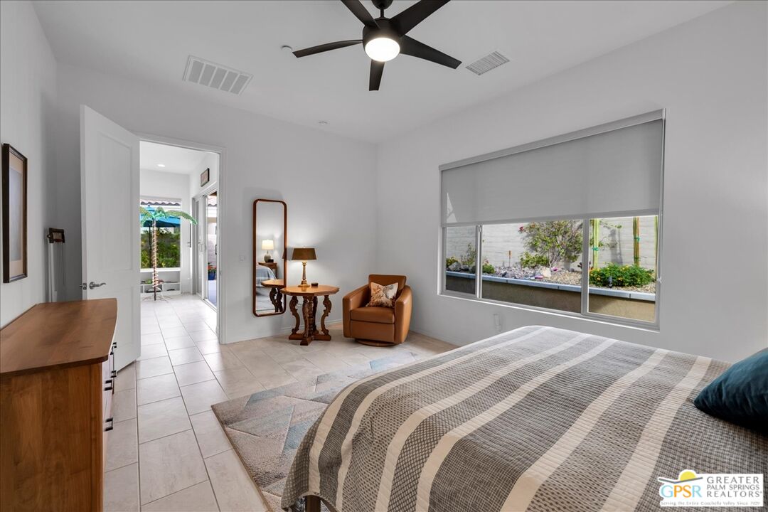 30 Cabernet Rancho Mirage, CA 92270 - Photo 19 of 31 a bedroom with a bed and window