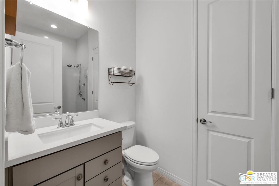 30 Cabernet Rancho Mirage, CA 92270 - Photo 23 of 31 a bathroom with a sink toilet and a mirror