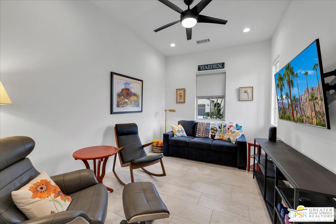 30 Cabernet Rancho Mirage, CA 92270 - Photo 25 of 31 a living room with furniture and a flat screen tv