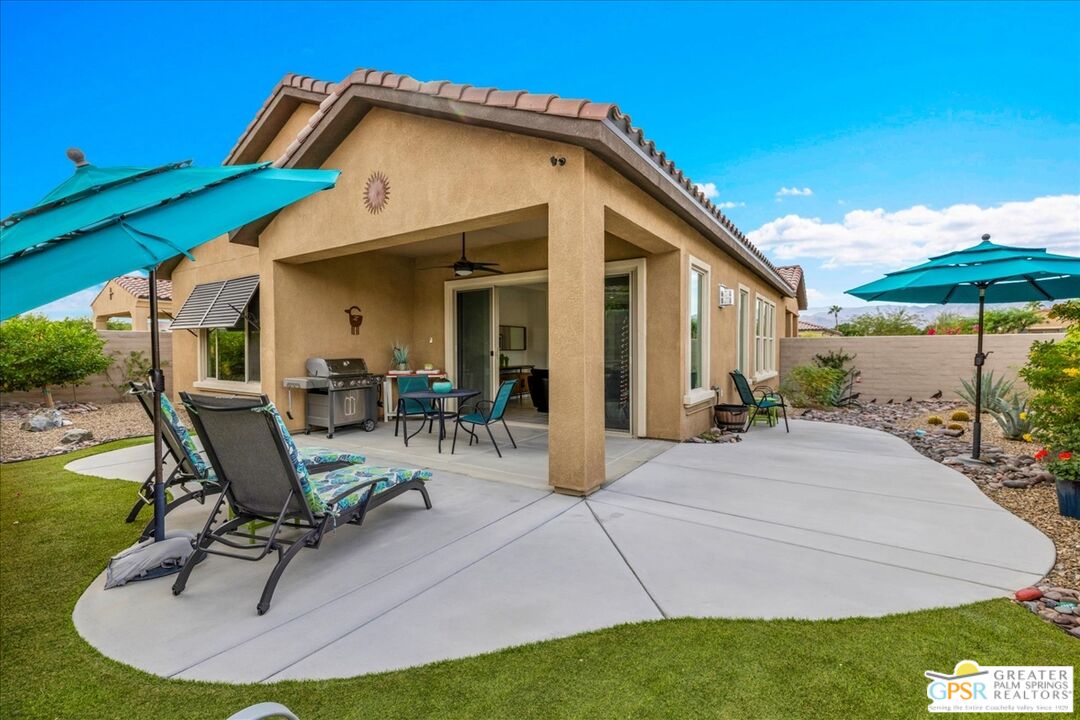 30 Cabernet Rancho Mirage, CA 92270 - Photo 28 of 31 a view of a house with backyard water fountain and sitting area