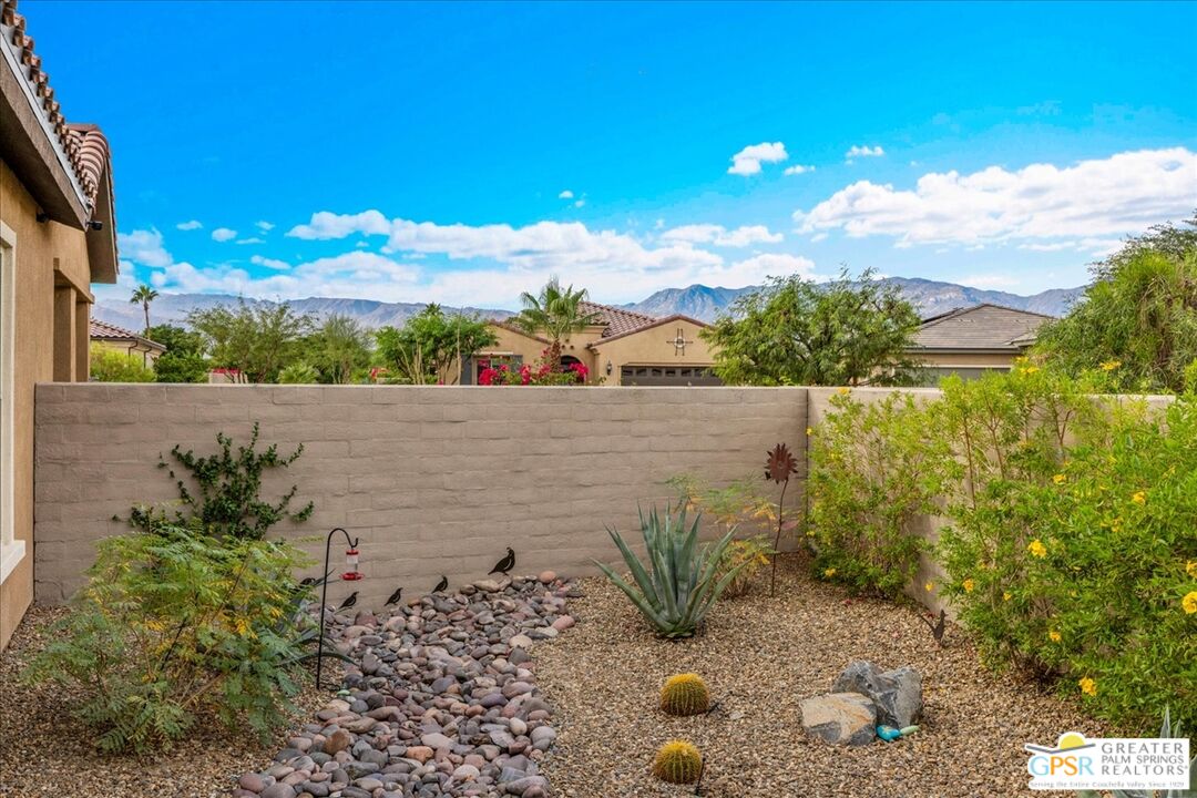 30 Cabernet Rancho Mirage, CA 92270 - Photo 30 of 31 a view of a lake with a mountain in the background