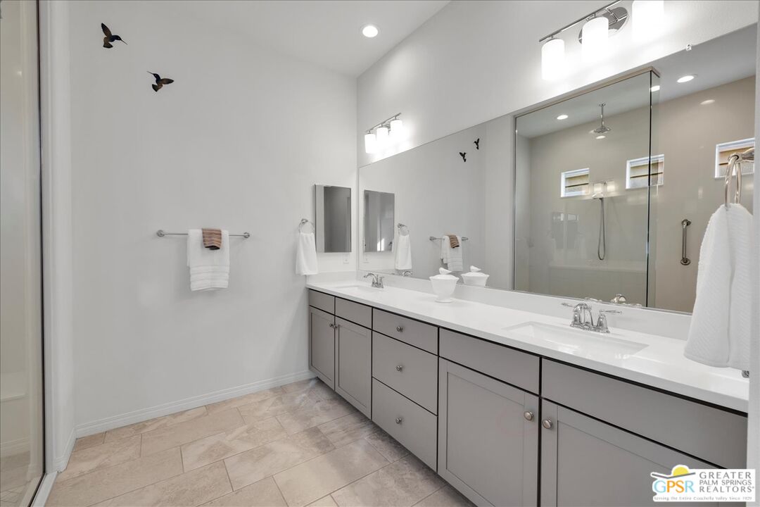 30 Cabernet Rancho Mirage, CA 92270 - Photo 5 of 31 a bathroom with a double vanity sink mirror and double