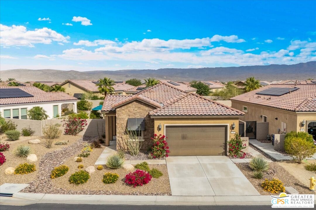 30 Cabernet Rancho Mirage, CA 92270 - Photo 10 of 31 a front view of a house with a yard