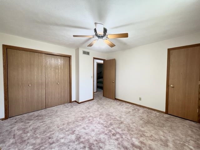 15286 Sharp Road Rockton, IL 61072 - Photo 17 of 19 a view of an empty room and a ceiling fan