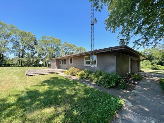 15286 Sharp Road Rockton, IL 61072 - Photo 3 of 19 a house view with a garden space