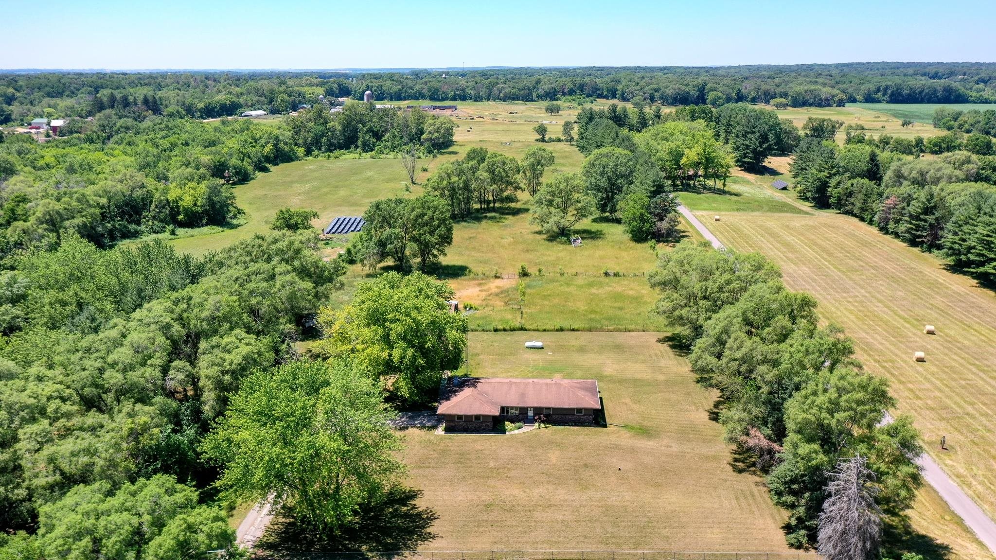 15286 Sharp Road Rockton, IL 61072 - Photo 4 of 19 a view of a lake with a yard
