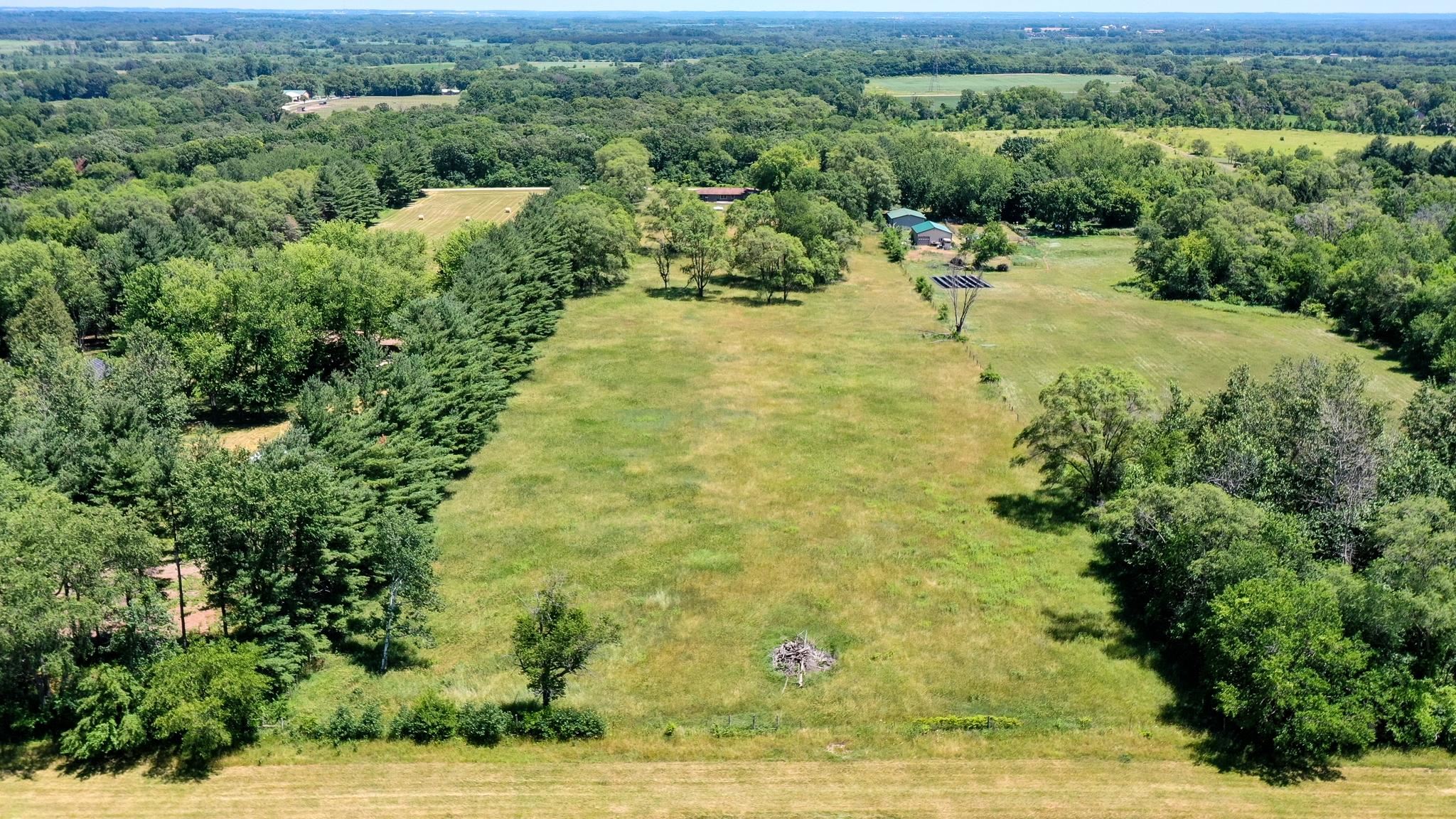 15286 Sharp Road Rockton, IL 61072 - Photo 7 of 19 a view of a garden with lawn chairs