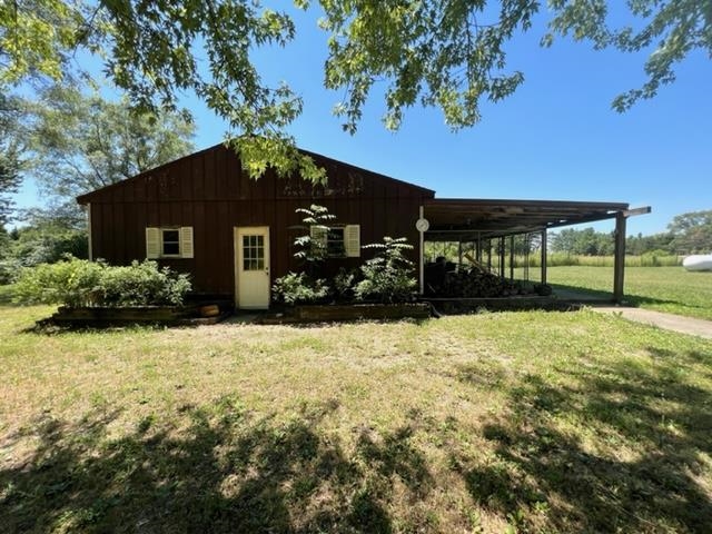15286 Sharp Road Rockton, IL 61072 - Photo 8 of 19 a view of house with yard