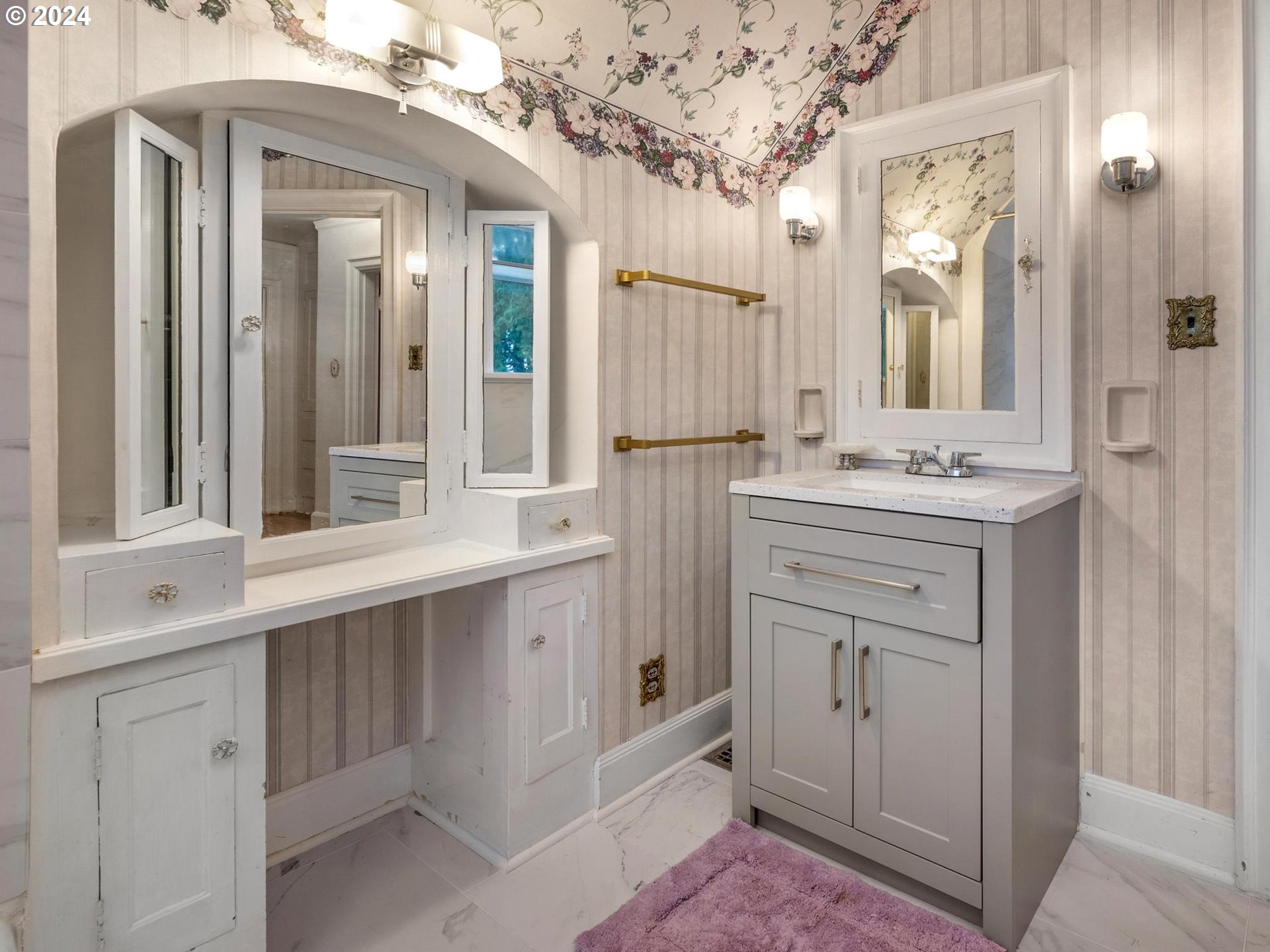 5523 Southwest Menefee Drive Portland, OR 97239 - Photo 16 of 22 a bathroom with a sink vanity and mirror