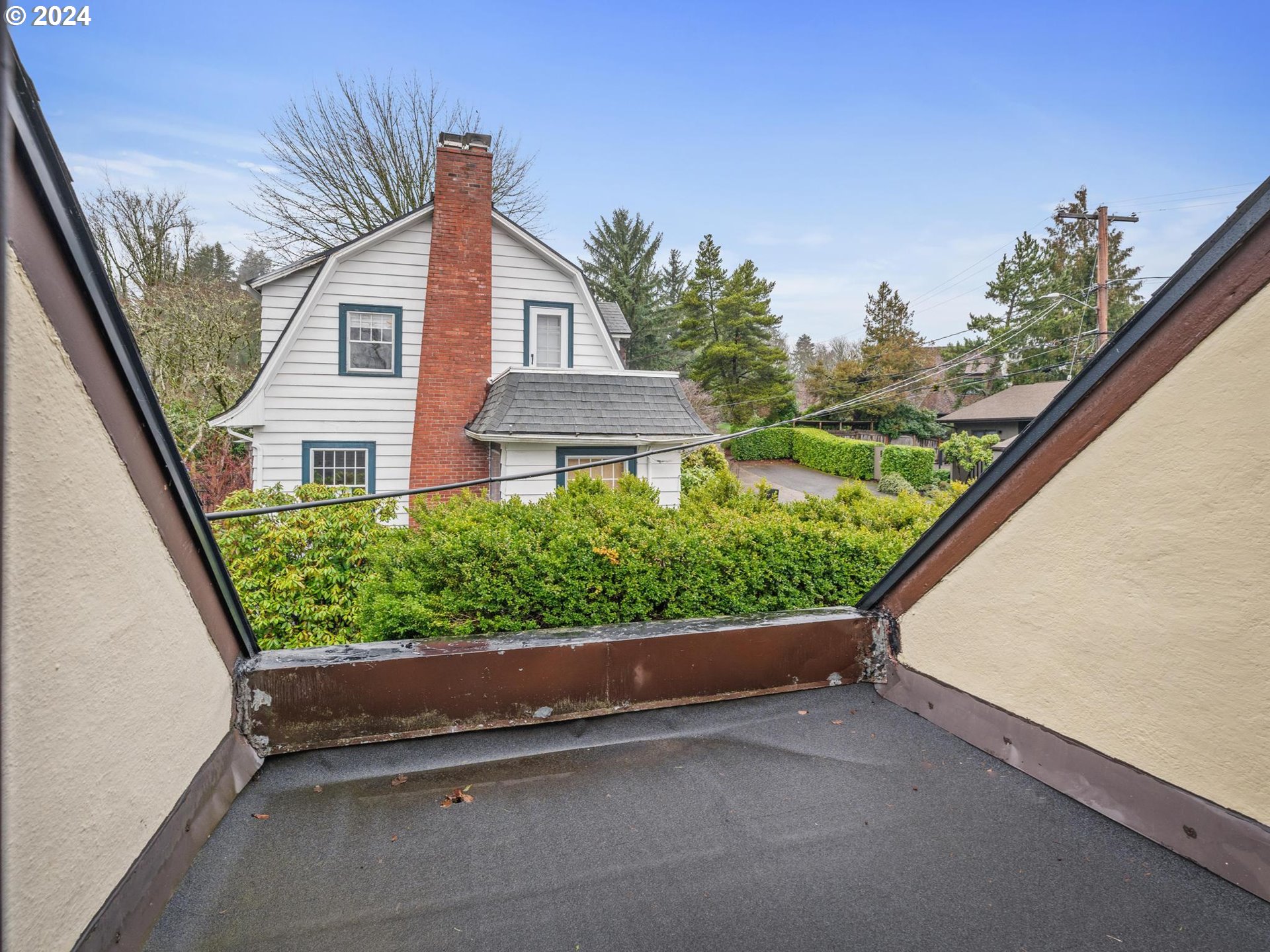 5523 Southwest Menefee Drive Portland, OR 97239 - Photo 19 of 22 a view of a small garden in front of a house