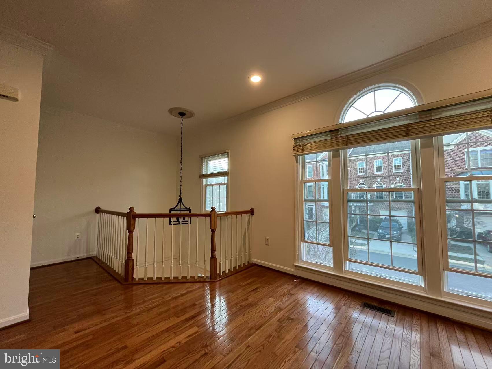4102 Kentmere Square Fairfax, VA 22030 - Photo 12 of 55 a view of a room with wooden floor fan and window