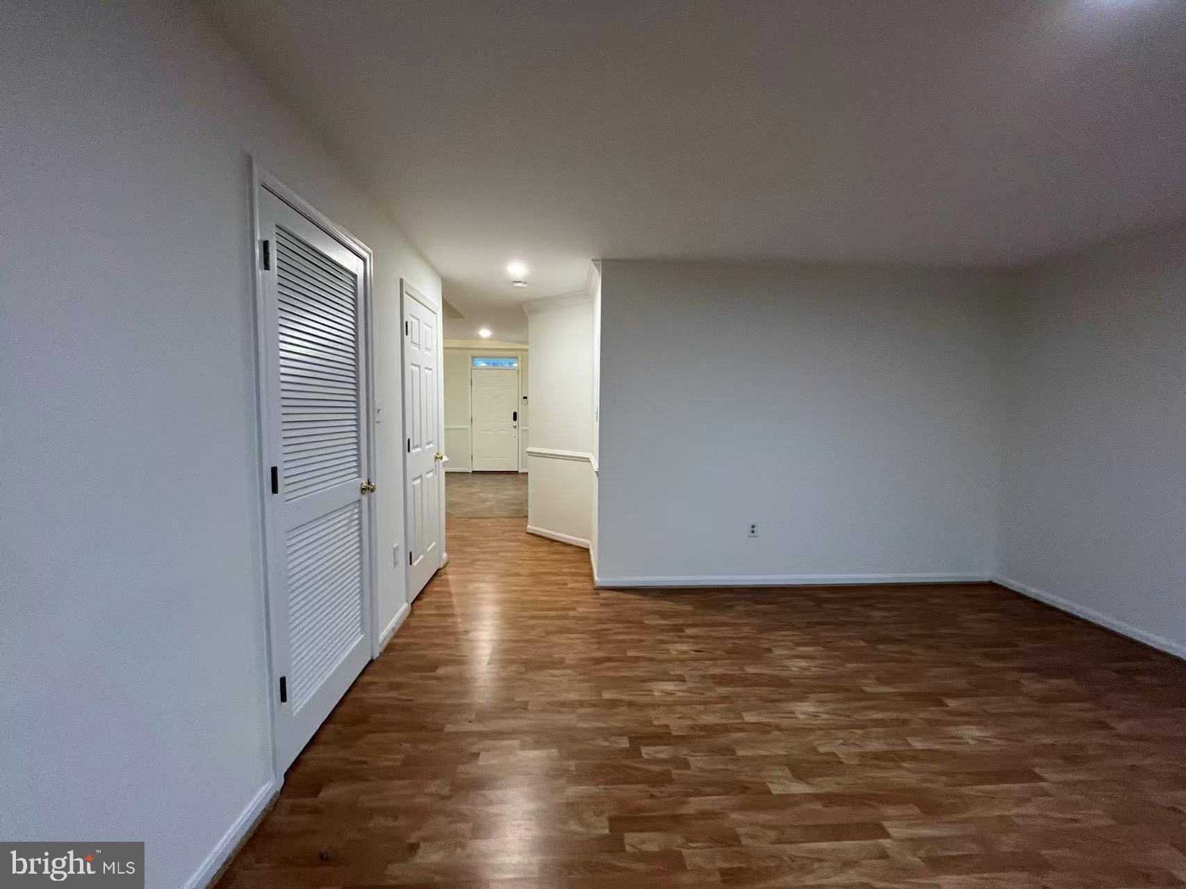 4102 Kentmere Square Fairfax, VA 22030 - Photo 17 of 55 a view of a hallway with wooden floor