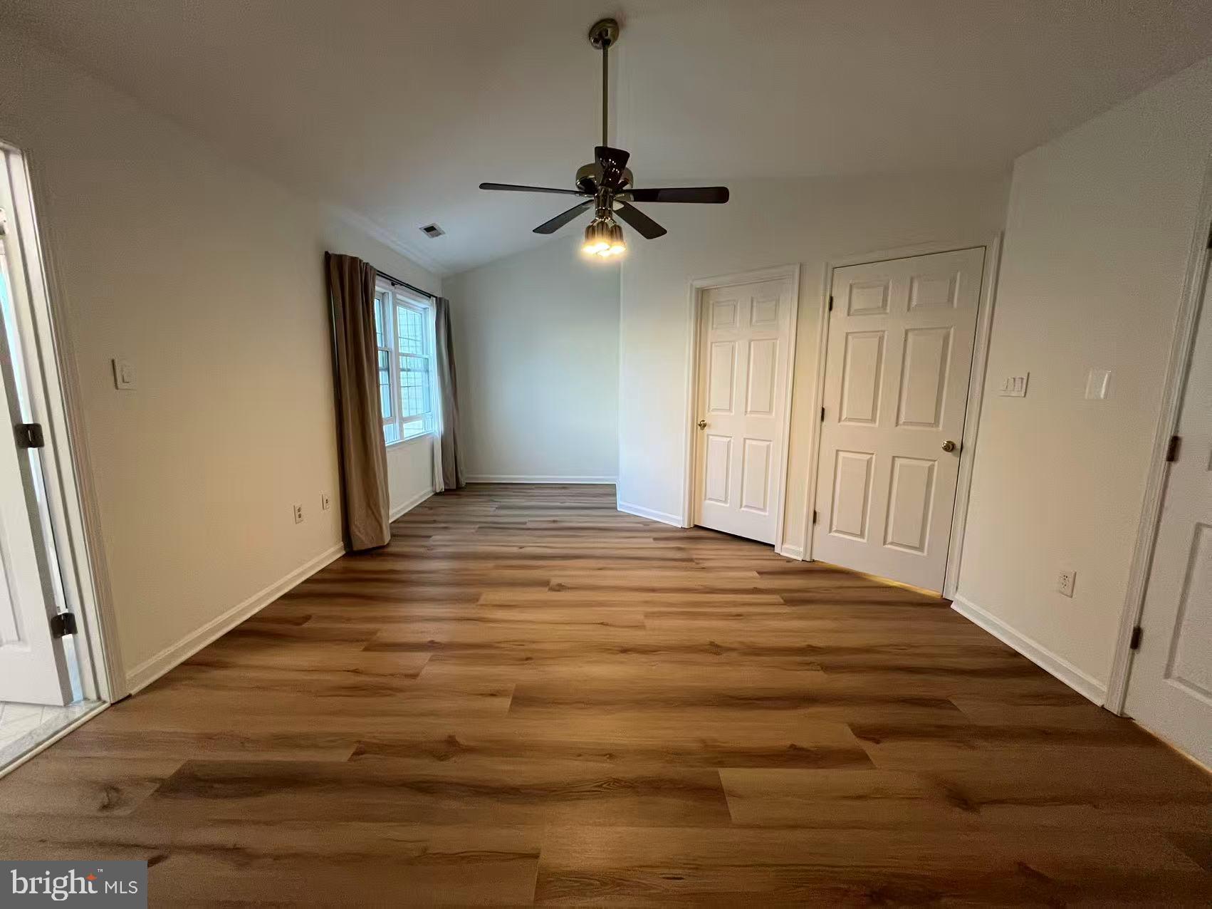 4102 Kentmere Square Fairfax, VA 22030 - Photo 31 of 55 a view of a livingroom with a ceiling fan and window