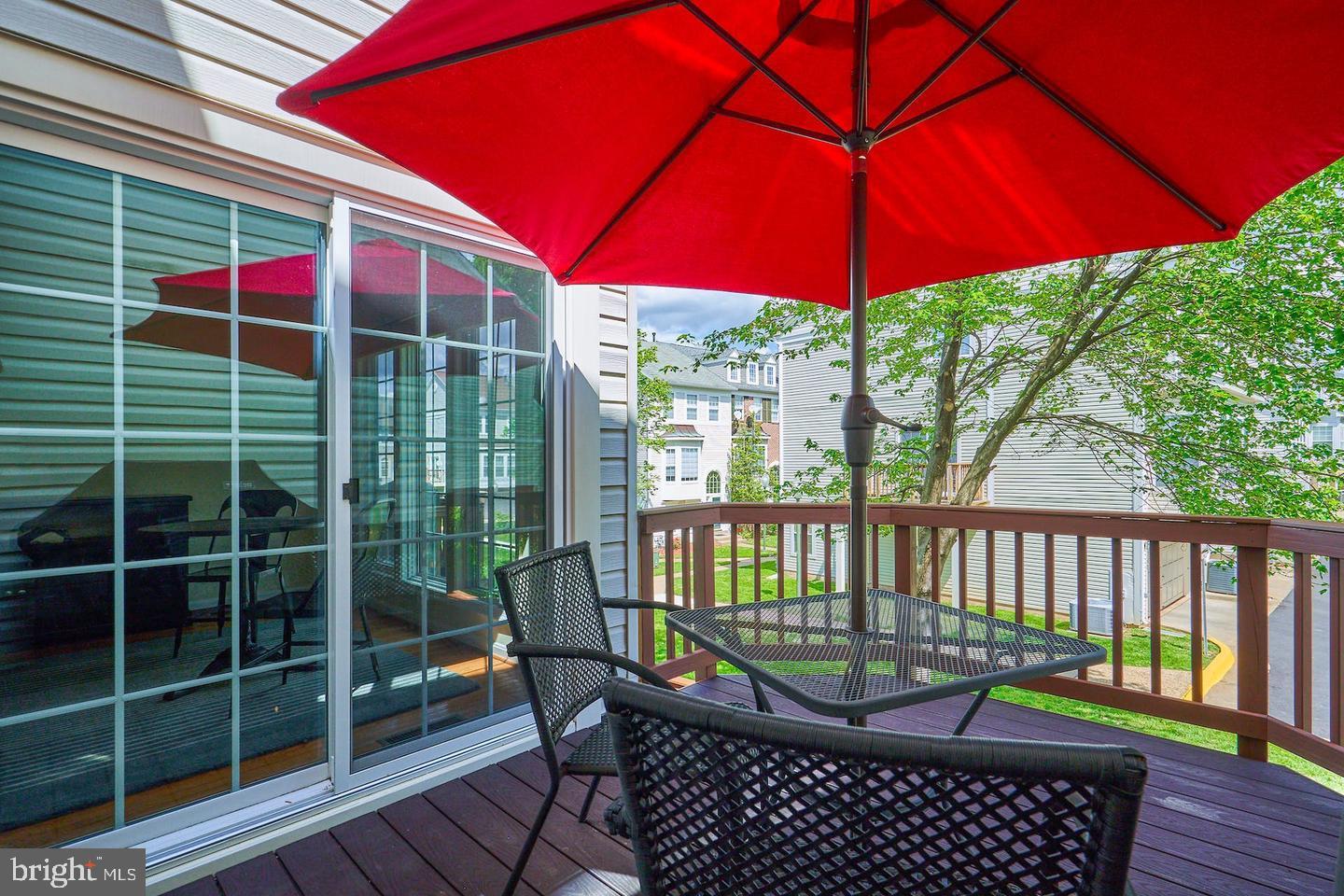 4102 Kentmere Square Fairfax, VA 22030 - Photo 45 of 55 a view of a chair and table on the deck