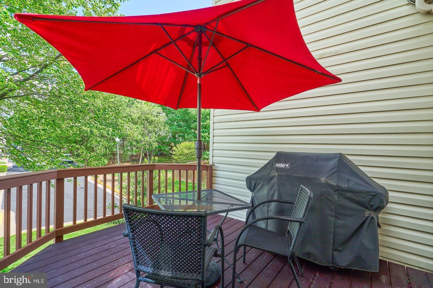 4102 Kentmere Square Fairfax, VA 22030 - Photo 47 of 55 a view of balcony with wooden floor and outdoor seating