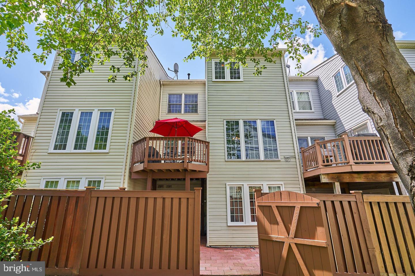 4102 Kentmere Square Fairfax, VA 22030 - Photo 48 of 55 a front view of a house with balcony