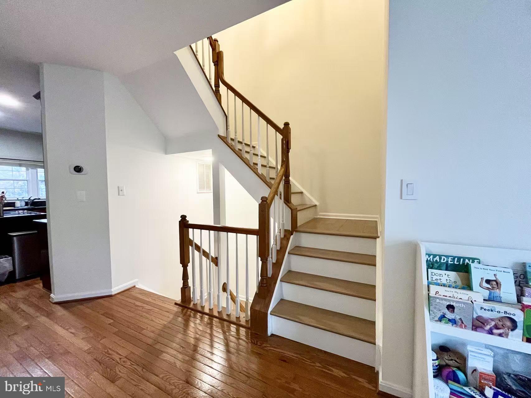 4102 Kentmere Square Fairfax, VA 22030 - Photo 5 of 55 a view of entryway with wooden floor and stairs