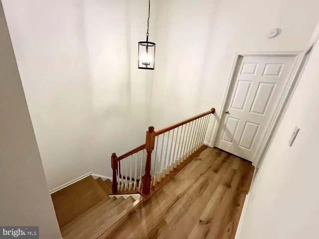 a view of a hallway with staircase