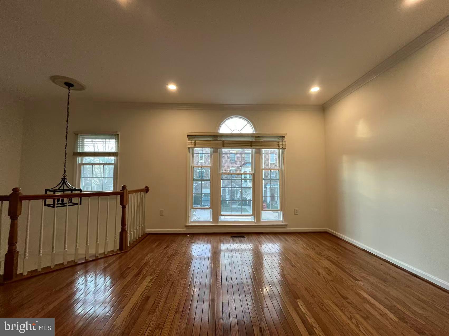 4102 Kentmere Square Fairfax, VA 22030 - Photo 10 of 55 a view of empty room with wooden floor and fan