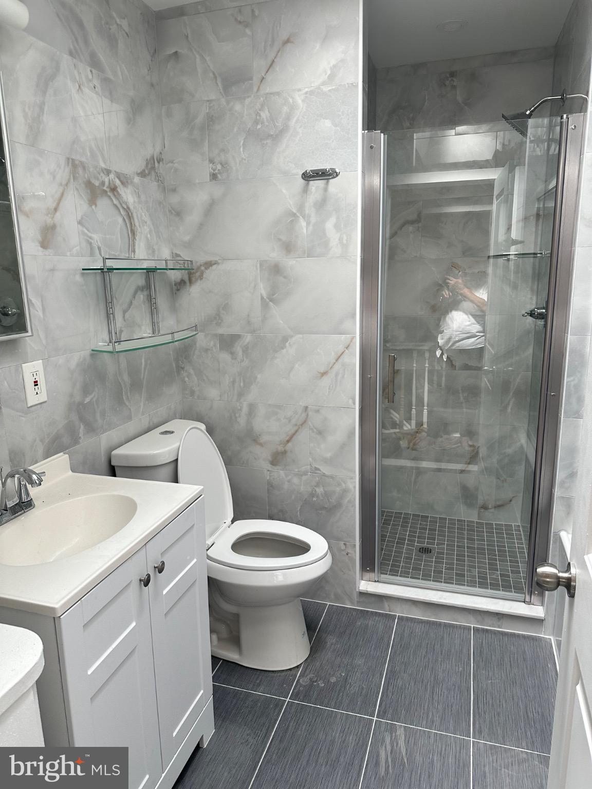 2146 East Washington Lane Philadelphia, PA 19138 - Photo 18 of 32 a bathroom with a sink toilet and shower