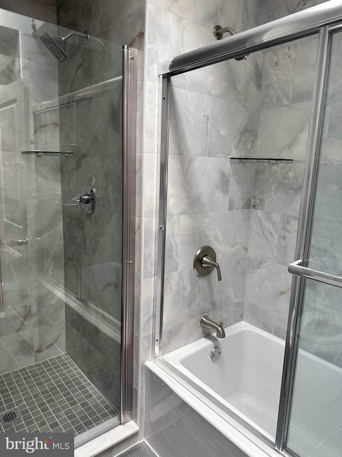 2146 East Washington Lane Philadelphia, PA 19138 - Photo 22 of 32 a bathroom with a shower and bathtub