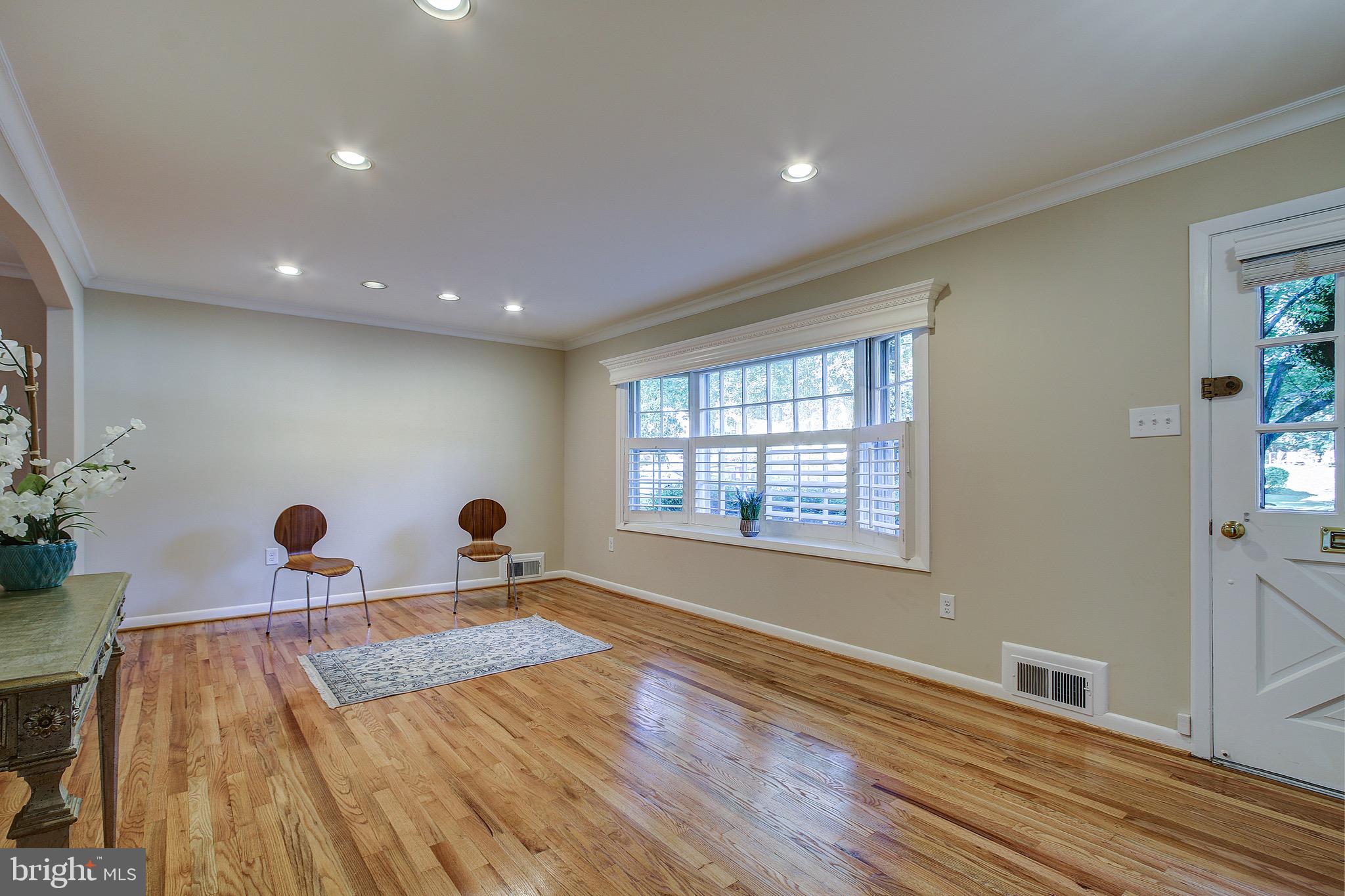12713 Barbara Road Wheaton, MD 20906 - Photo 5 of 32 Spacious Living Room with Gleaming Hardwoods.
