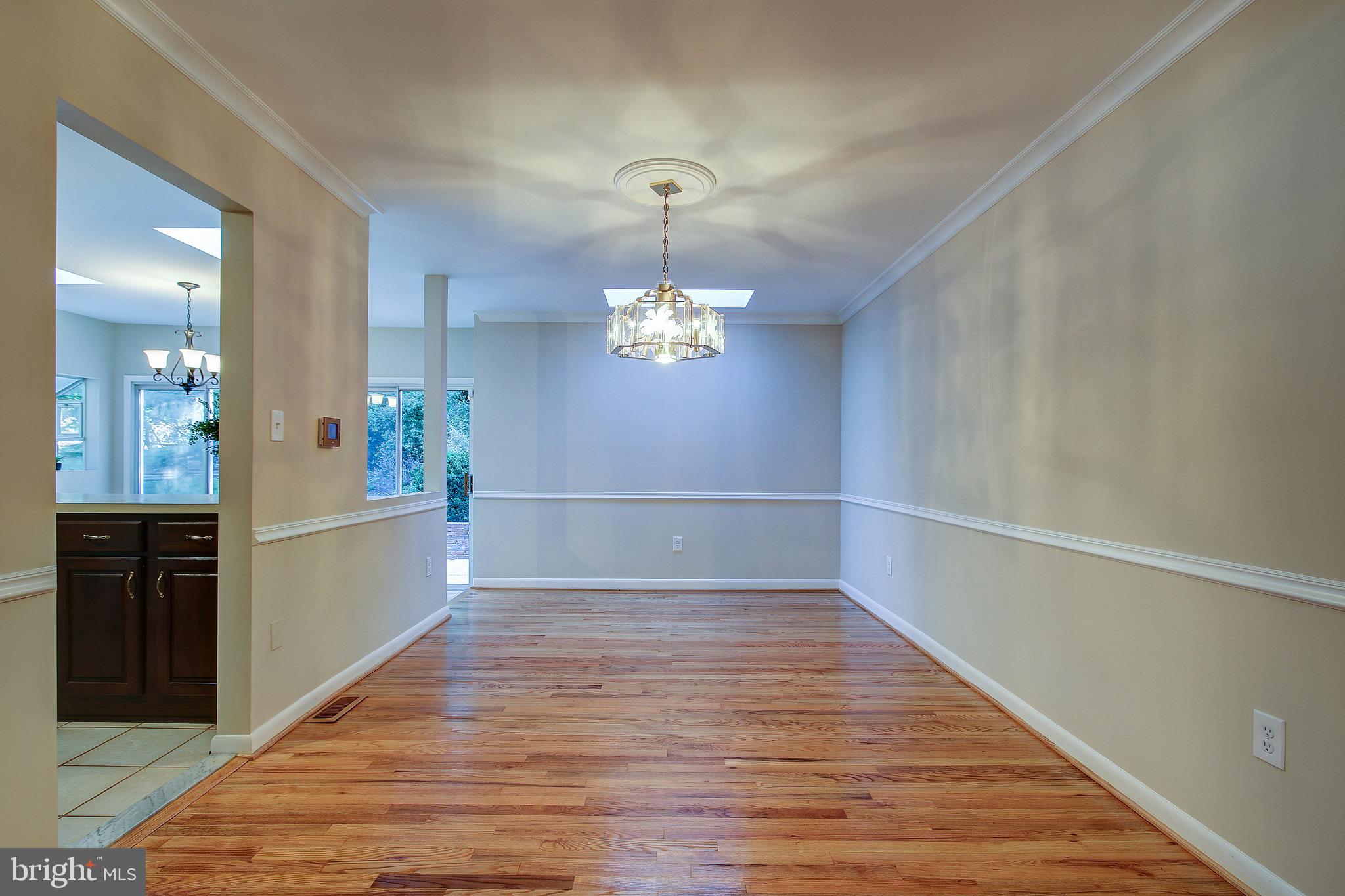 12713 Barbara Road Wheaton, MD 20906 - Photo 8 of 32 Enlarged Dining Room Leads to the Bright Kitchen!