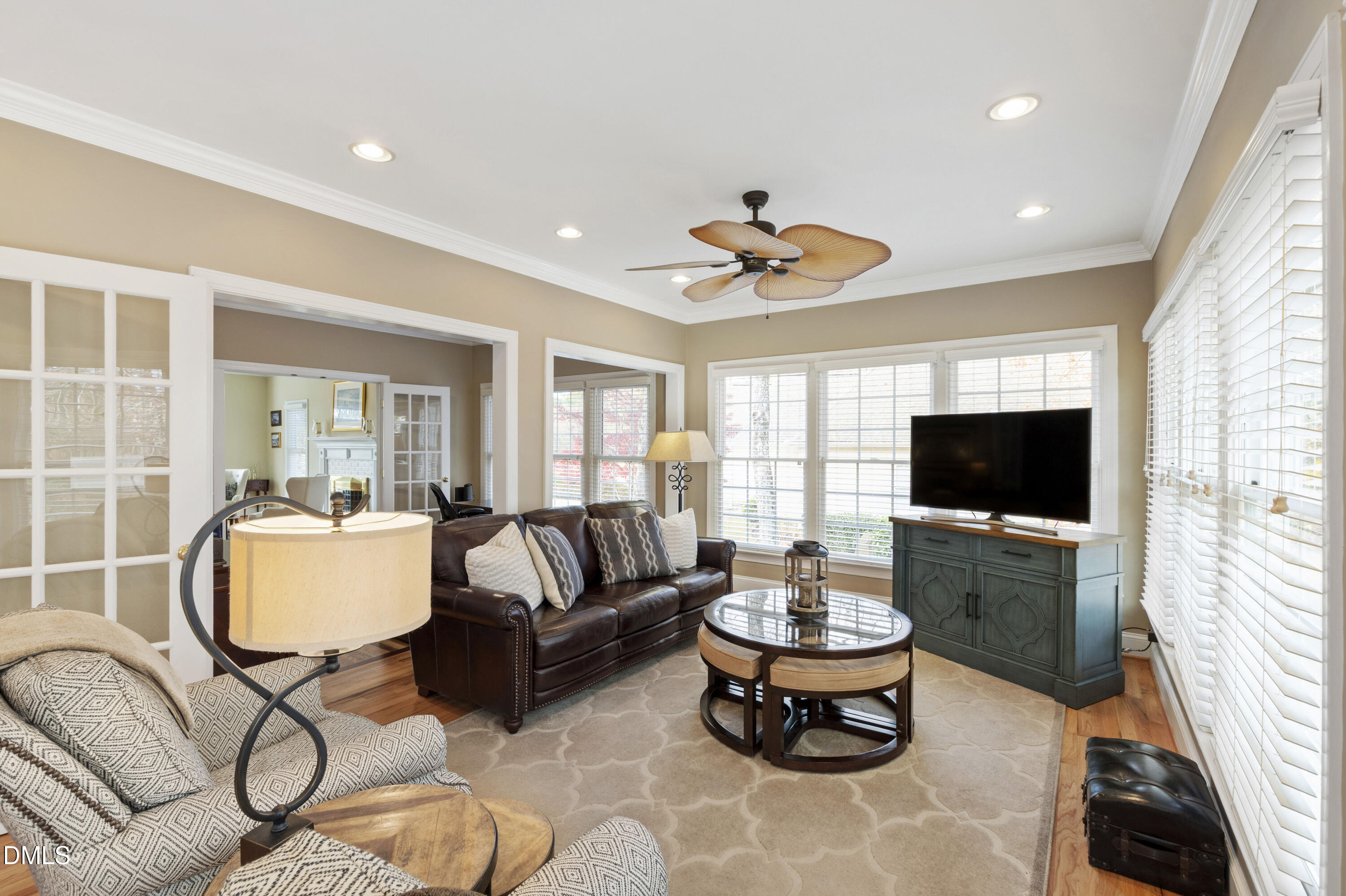 2405 Welsh Tavern Way Wake Forest, NC 27587 - Photo 12 of 58 a living room with furniture and a flat screen tv