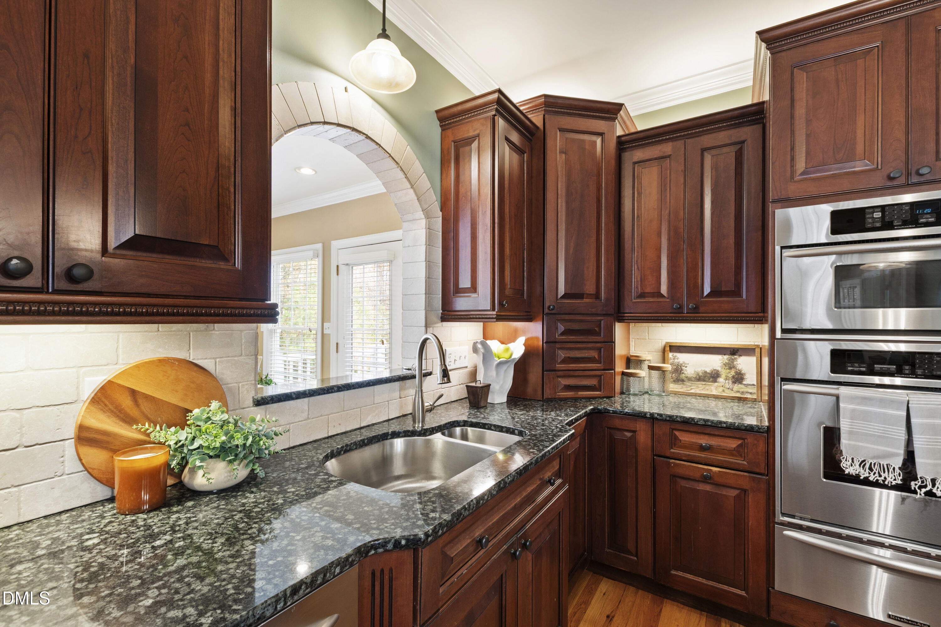 2405 Welsh Tavern Way Wake Forest, NC 27587 - Photo 22 of 58 a kitchen with stainless steel appliances granite countertop a sink a stove and refrigerator