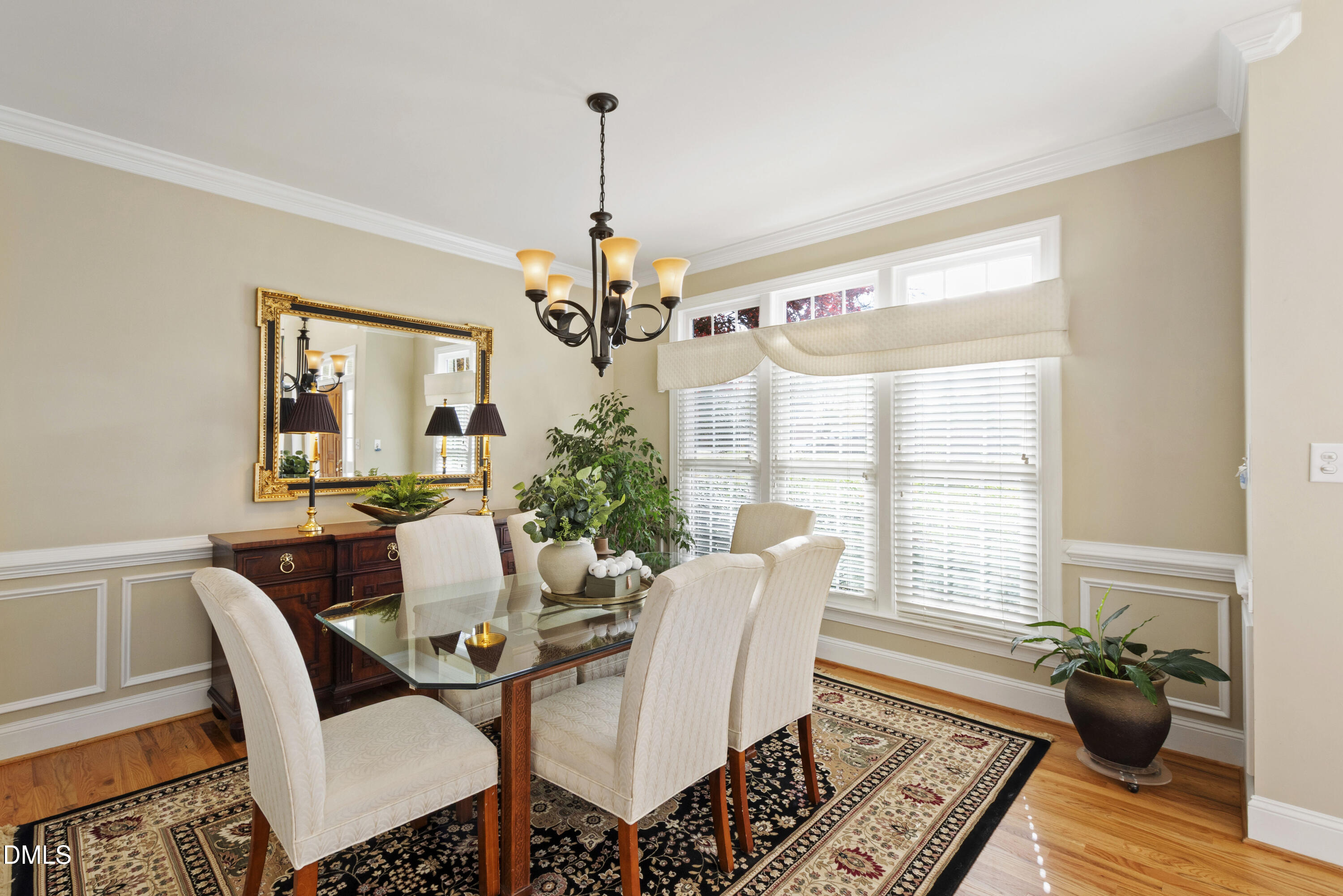 2405 Welsh Tavern Way Wake Forest, NC 27587 - Photo 24 of 58 a view of a dining room with furniture window and wooden floor