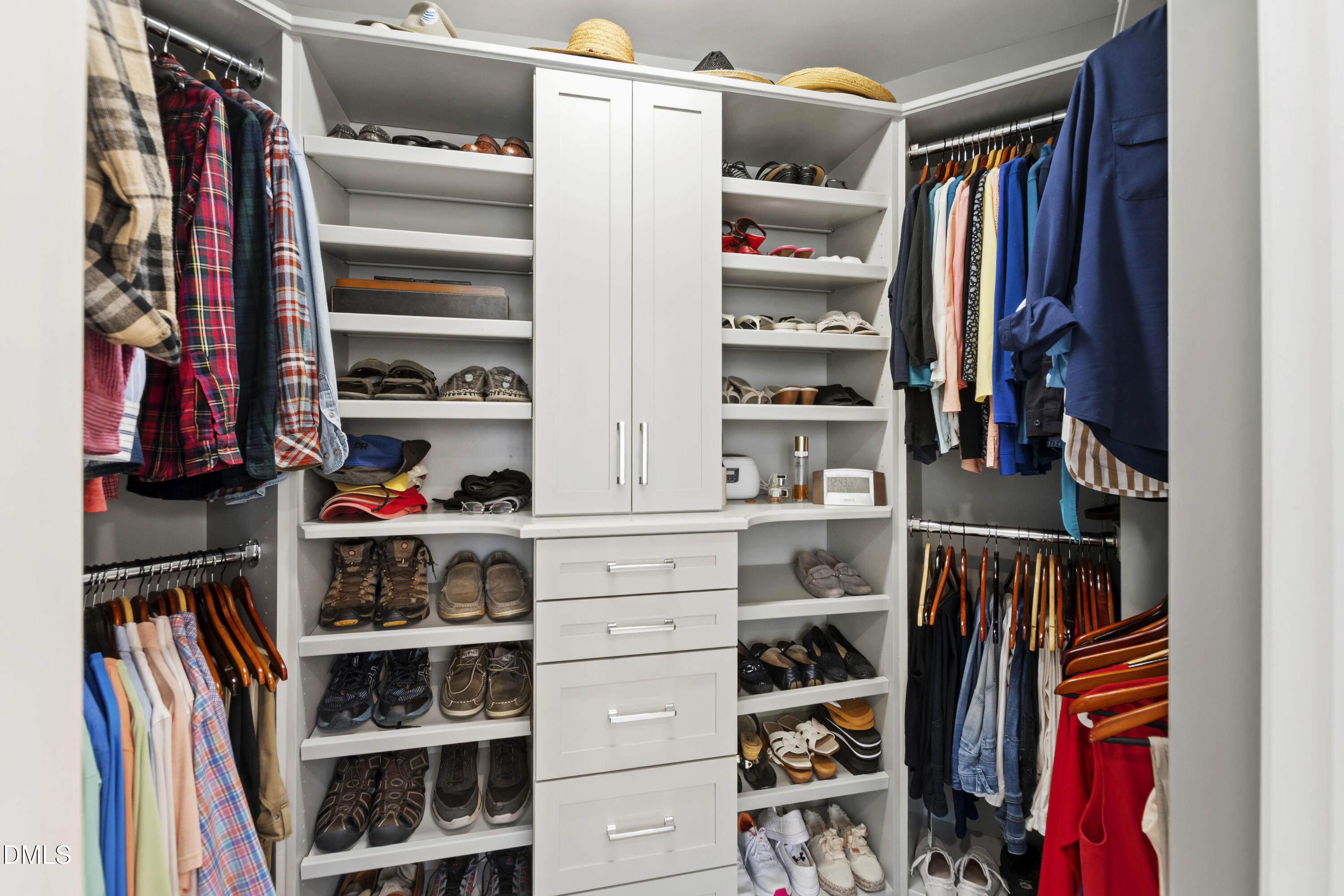 2405 Welsh Tavern Way Wake Forest, NC 27587 - Photo 36 of 58 a view of walk in closet with clothes and shoes