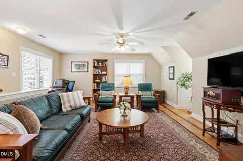 a backyard of a house with lots of green space