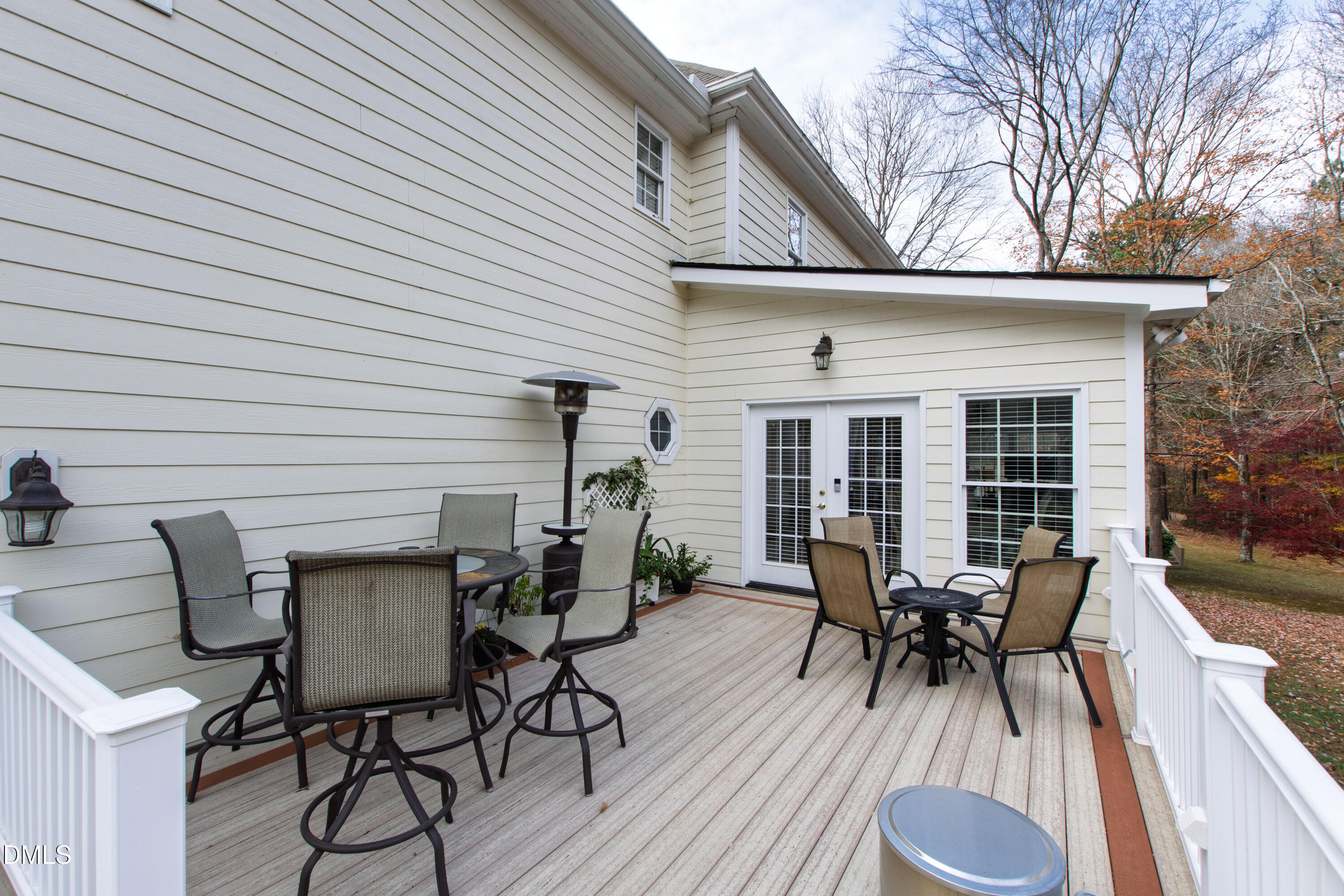 2405 Welsh Tavern Way Wake Forest, NC 27587 - Photo 49 of 58 a view of a house with patio and wooden floor