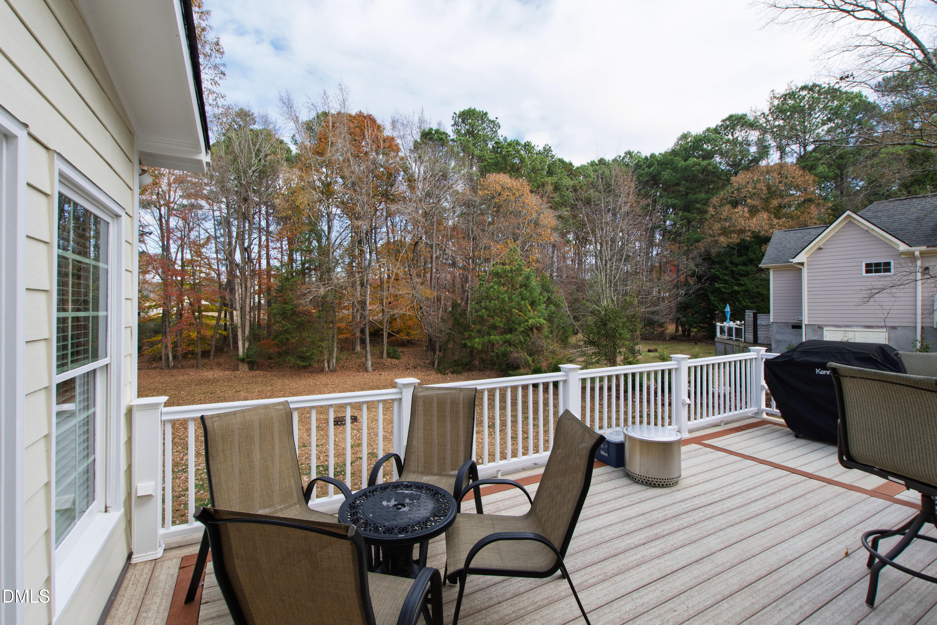 2405 Welsh Tavern Way Wake Forest, NC 27587 - Photo 50 of 58 a view of a balcony with wooden floor and outdoor seating