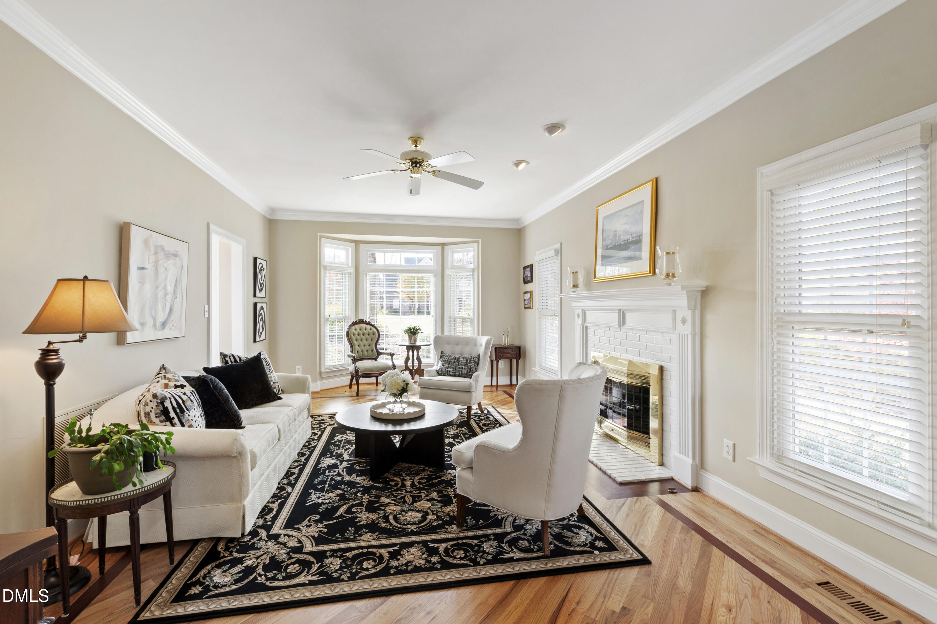 2405 Welsh Tavern Way Wake Forest, NC 27587 - Photo 7 of 58 a living room with furniture fireplace and a large window