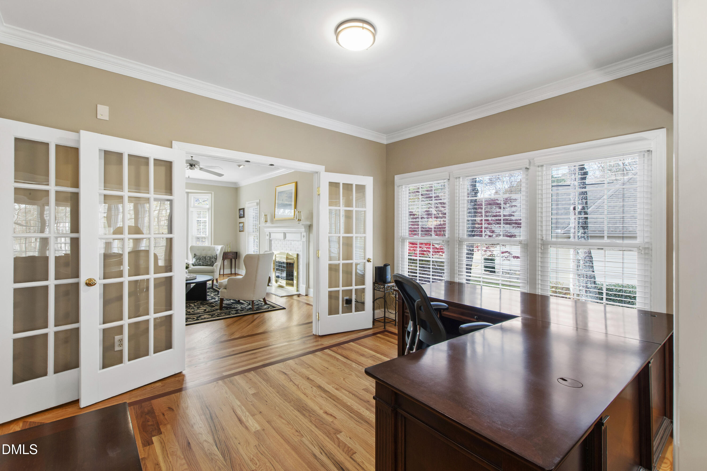 2405 Welsh Tavern Way Wake Forest, NC 27587 - Photo 9 of 58 a living room with furniture large window and wooden floor