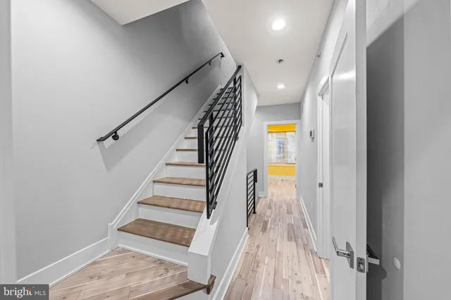 a bathroom with a shower and toilet