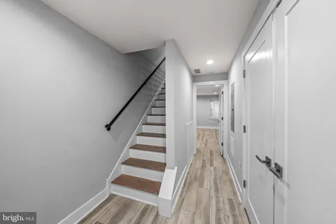 a view of side deck with large trees