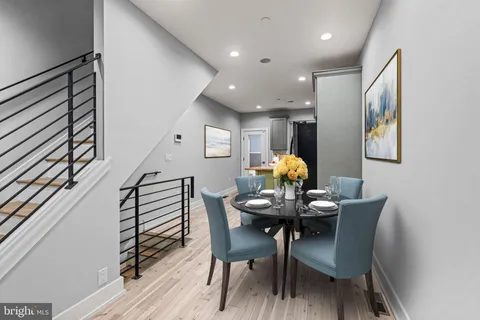 a bathroom with a toilet a sink and shower