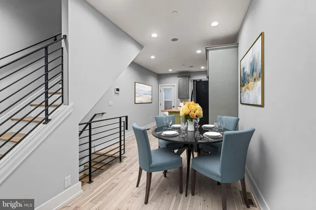 a bathroom with a toilet a sink and shower