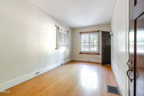 a view of entryway with wooden floor