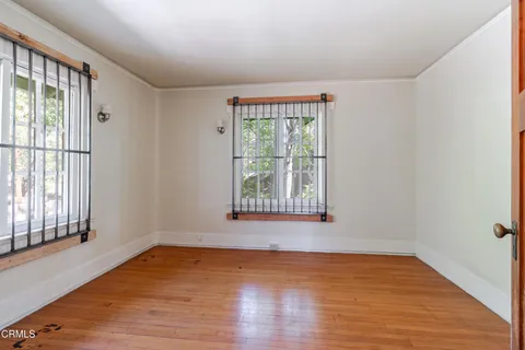 a spacious bathroom with a tub shower and sink