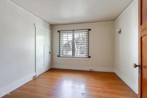a spacious bathroom with a tub and a toilet